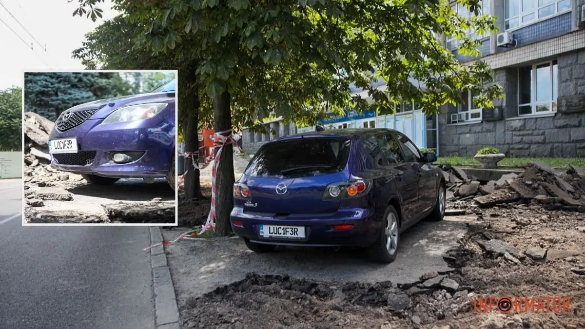 У Дніпрі на проспекті Яворницького під час ремонту залишили "острівець" асфальту під припаркованим авто